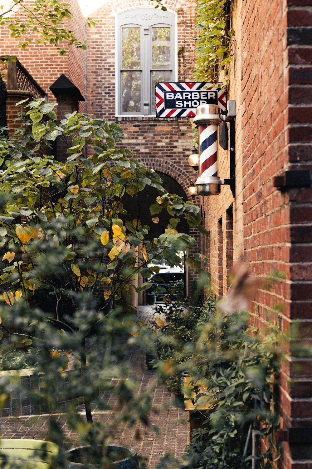 a street sign on a brick building