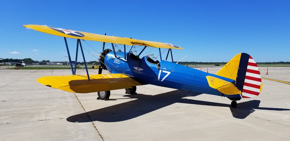 a small yellow and blue airplane