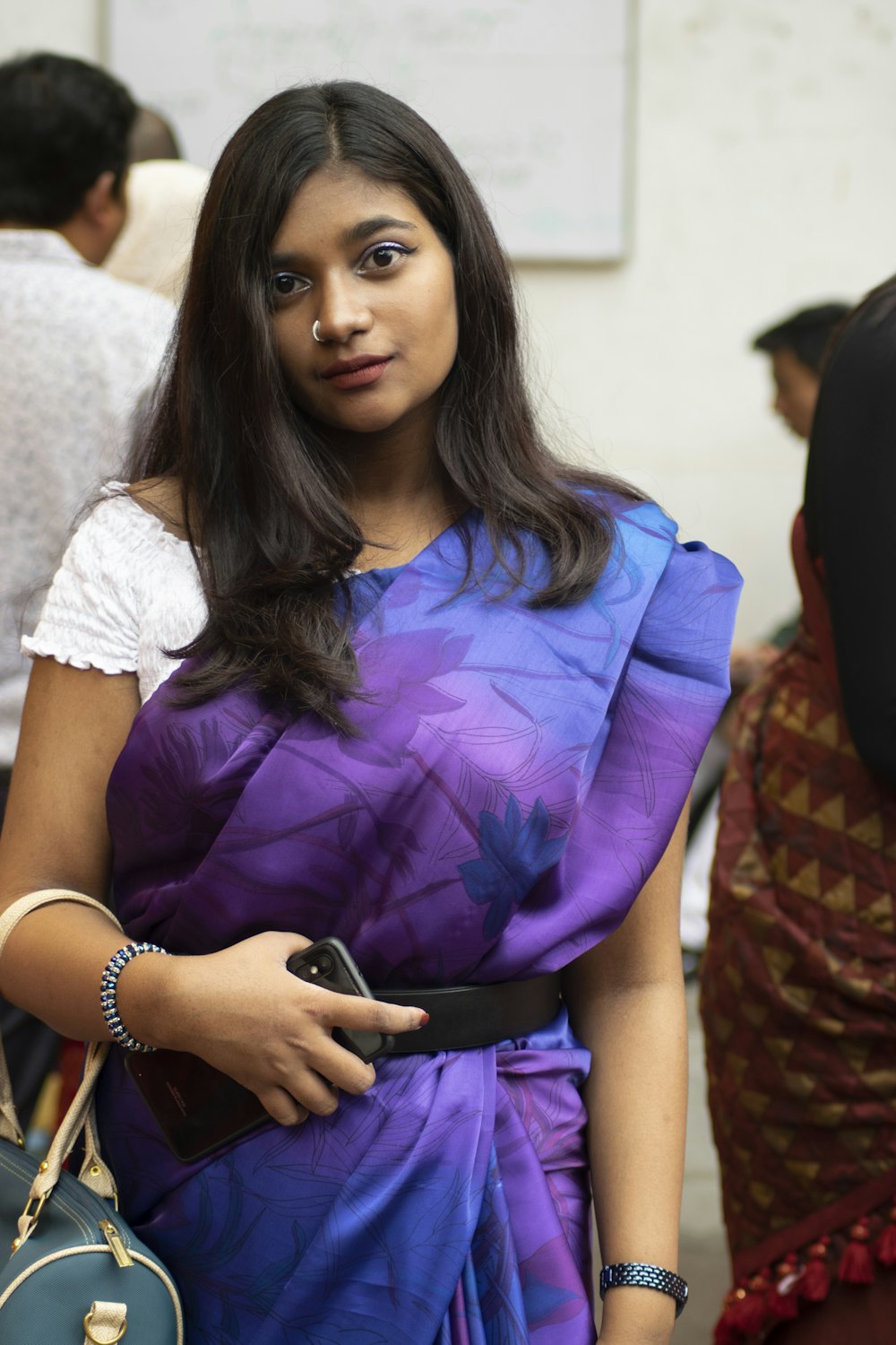 a woman in a purple dress