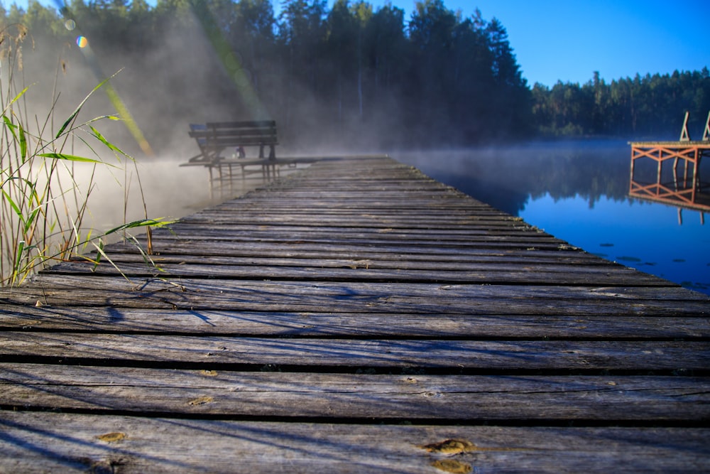 a wooden dock over water