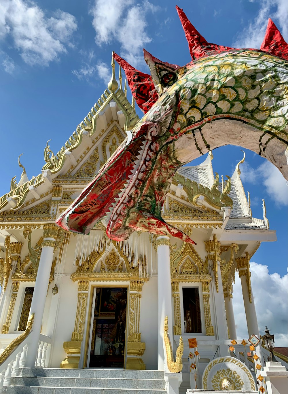 a building with a large dragon roof