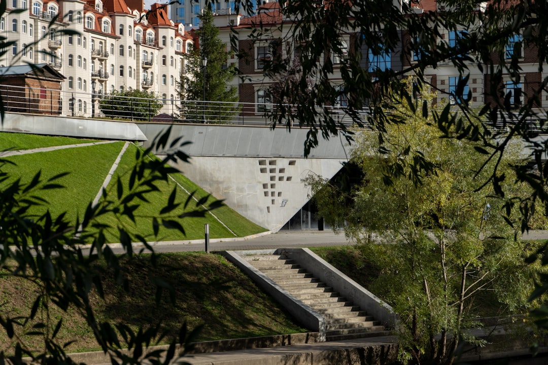 a building with a pool in front,