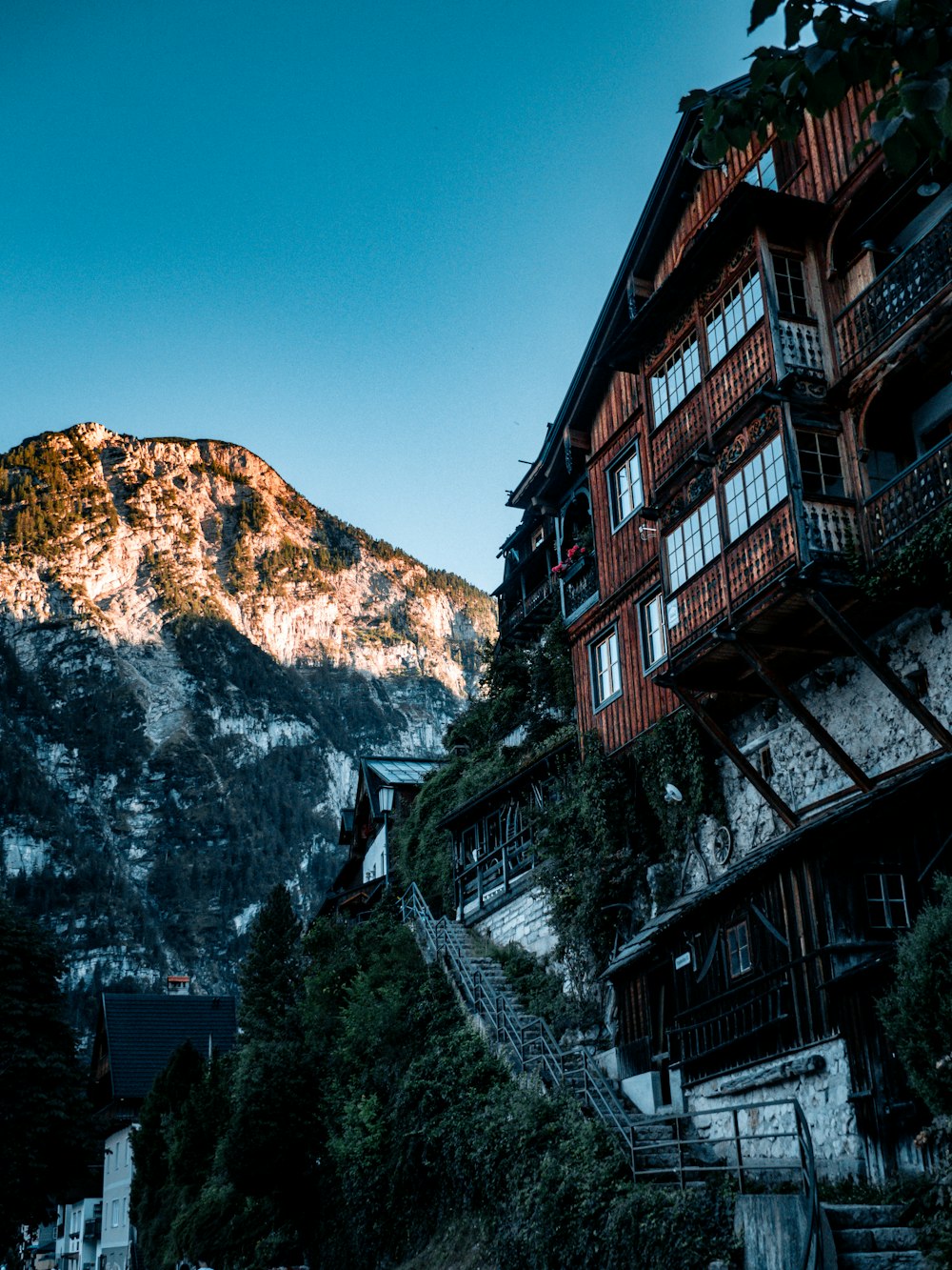 a building with a mountain in the background