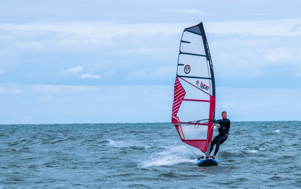 a man wind surfing in the sea