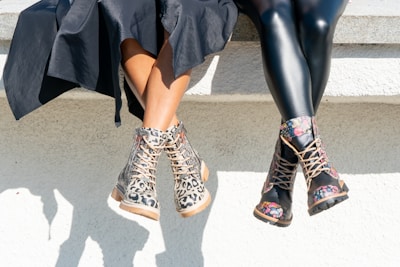 a pair of legs wearing boots