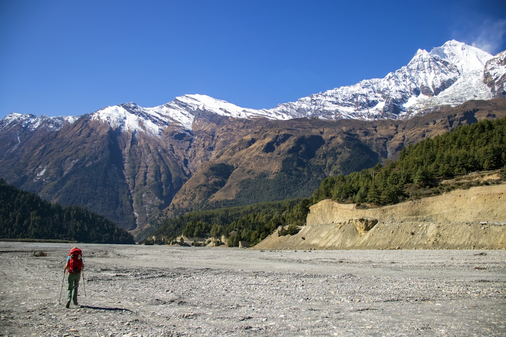 a person walking on a mountain