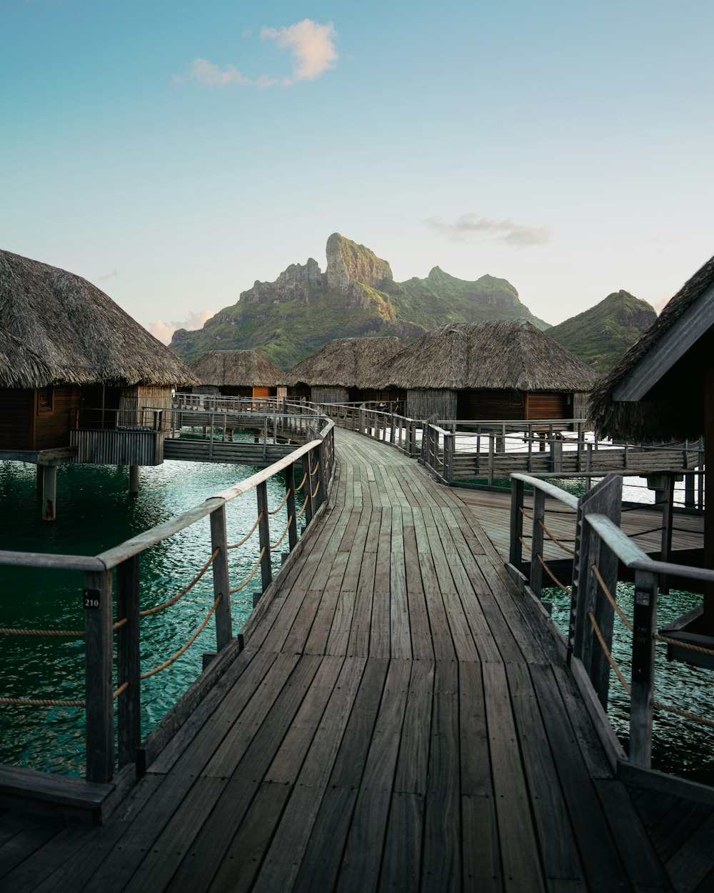 a wooden bridge over water