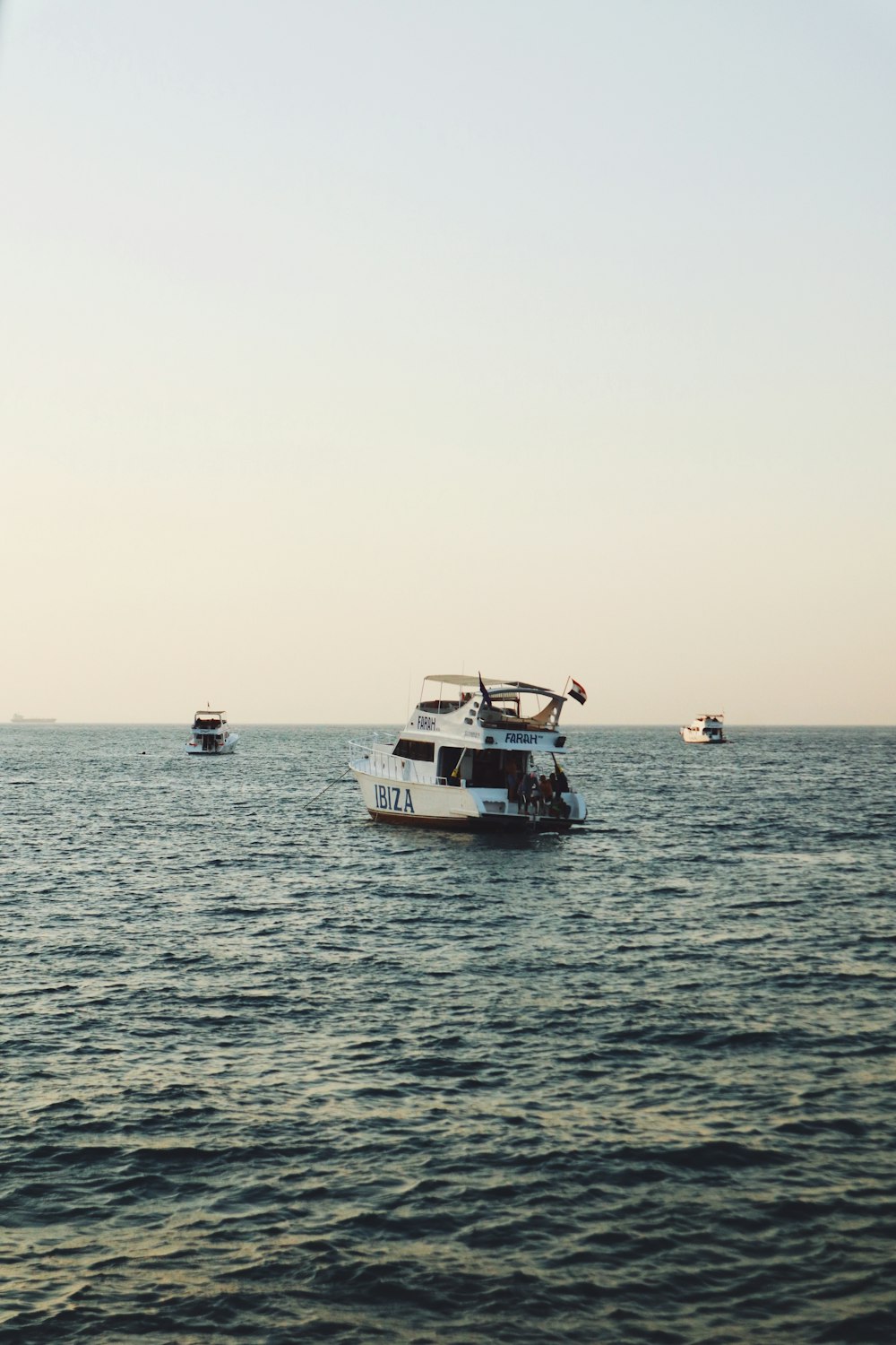 a group of boats on the water