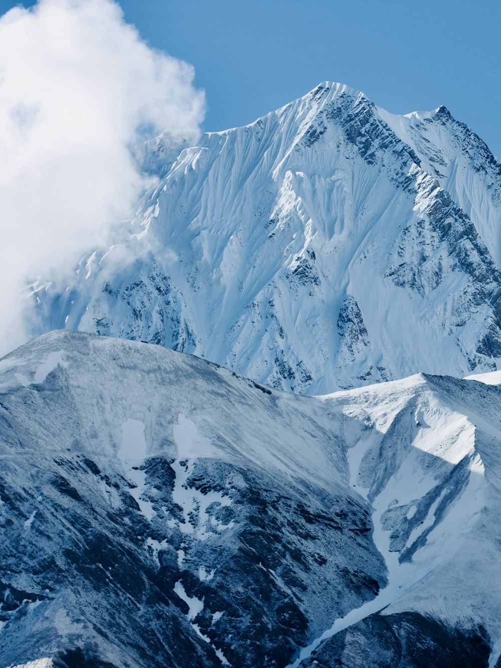 a mountain with snow