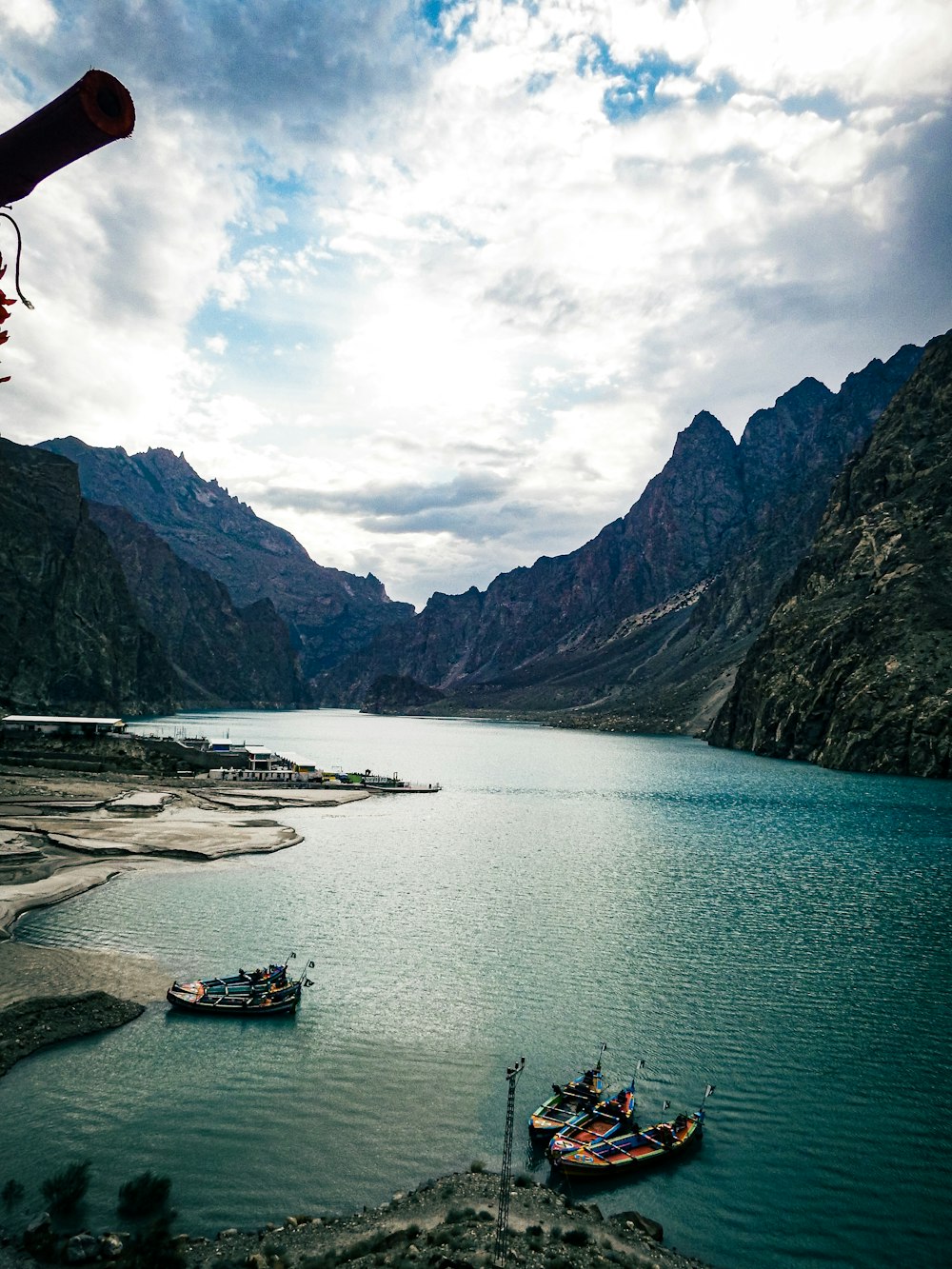 a couple of boats on a river