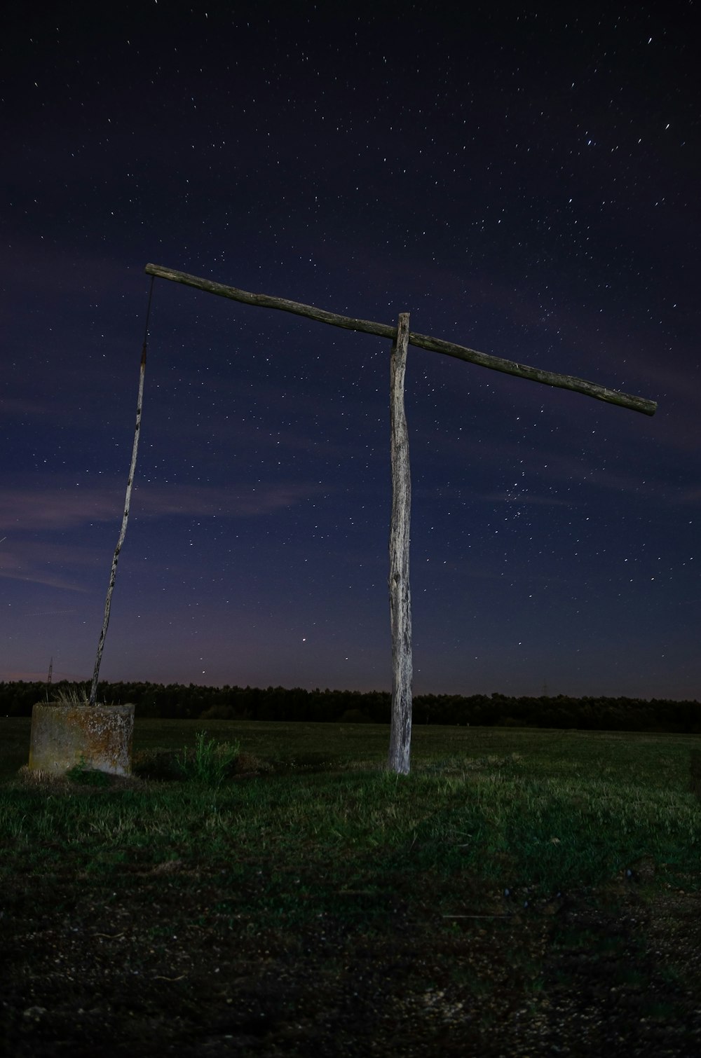 a large windmill in a field