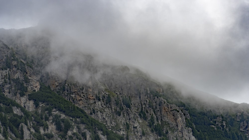 a mountain with clouds