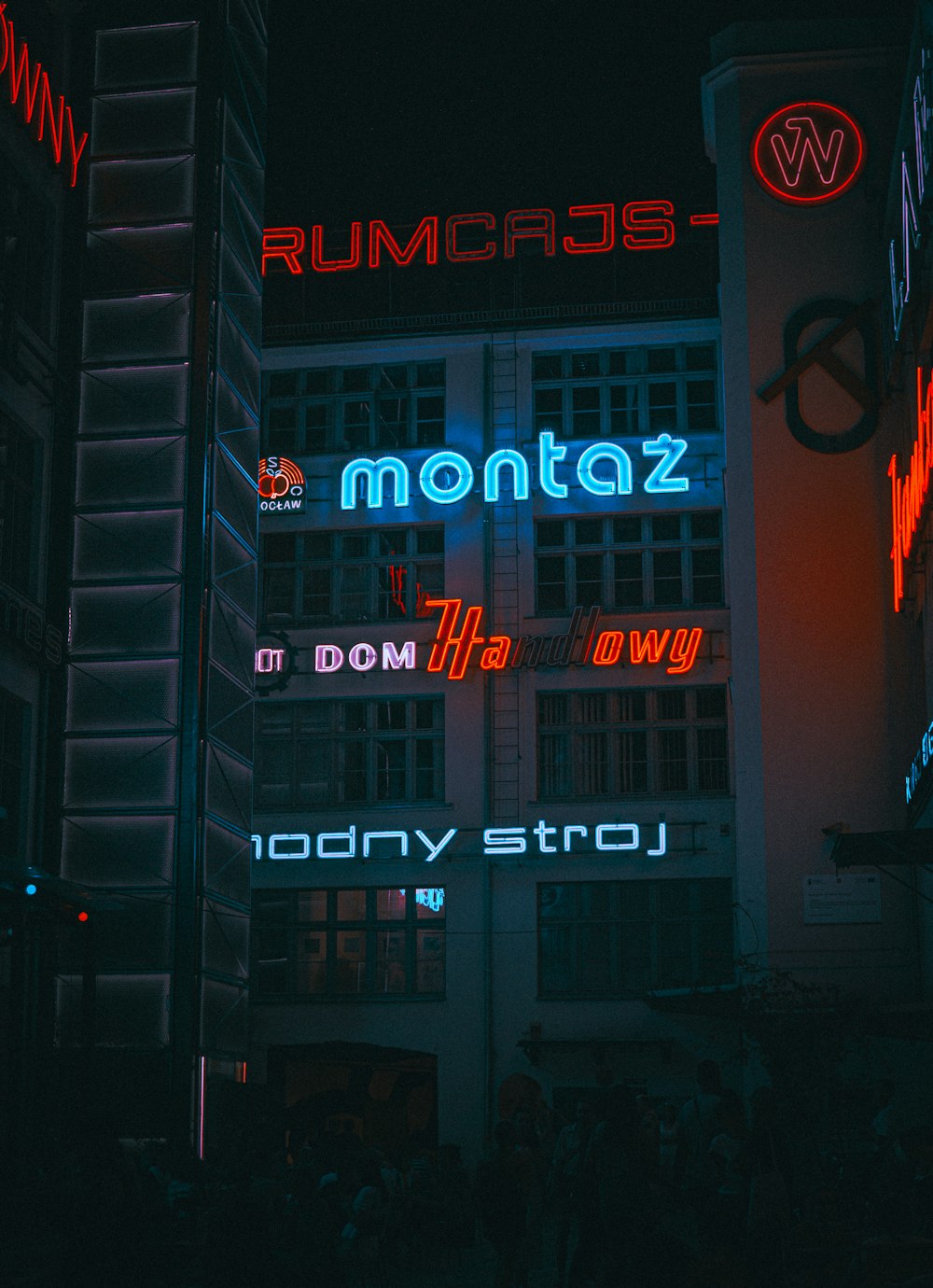 a building with neon signs