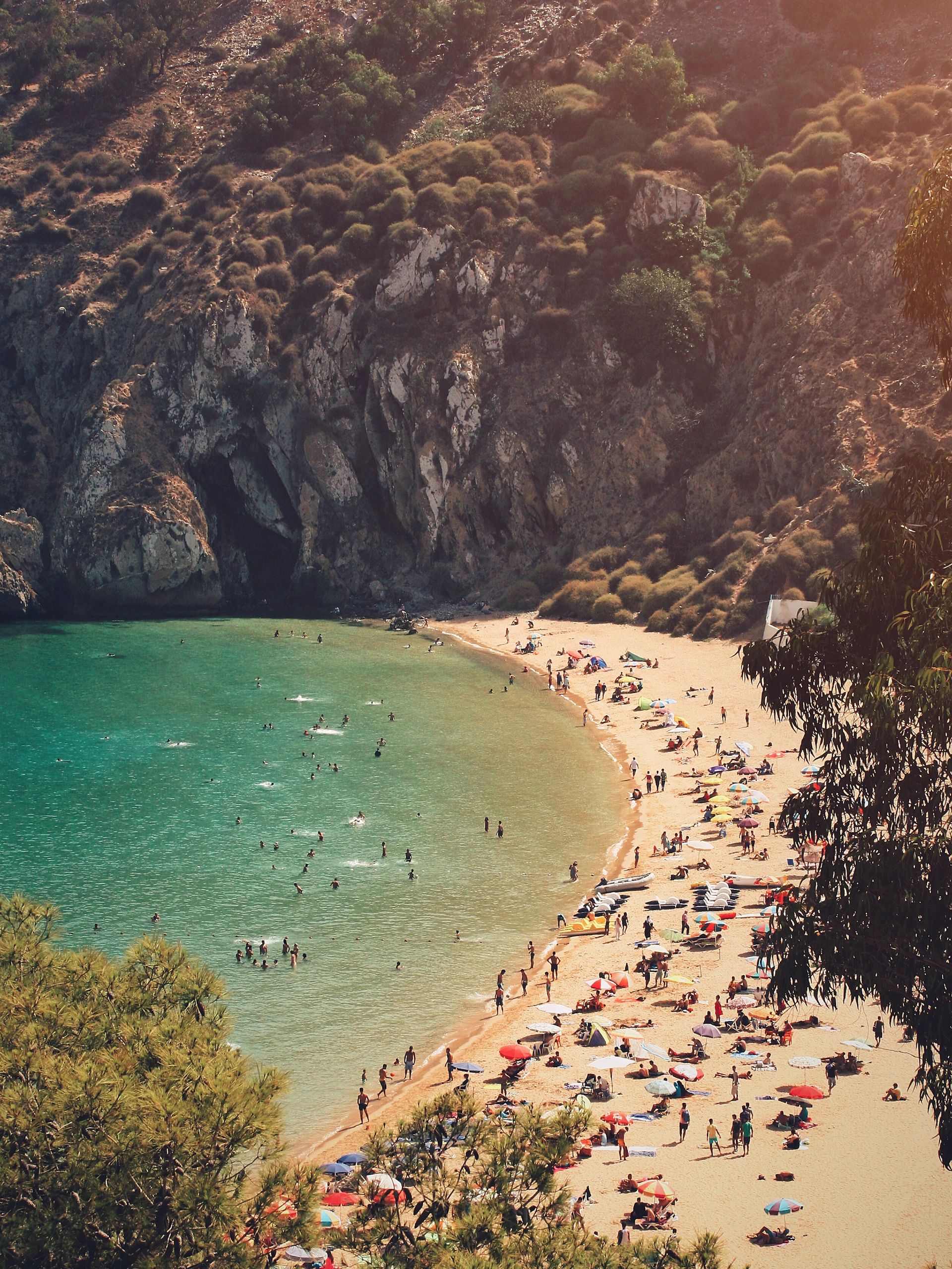 a beach with people on it