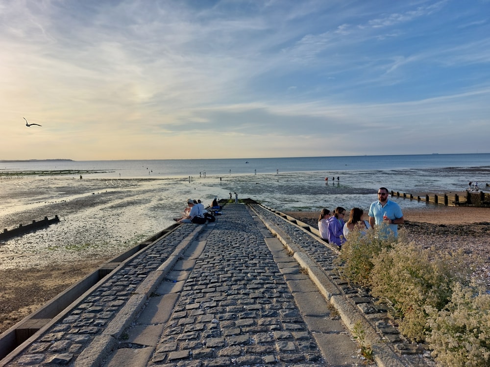 a group of people on a beach