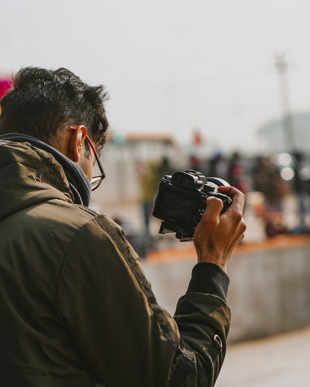 a man holding a camera