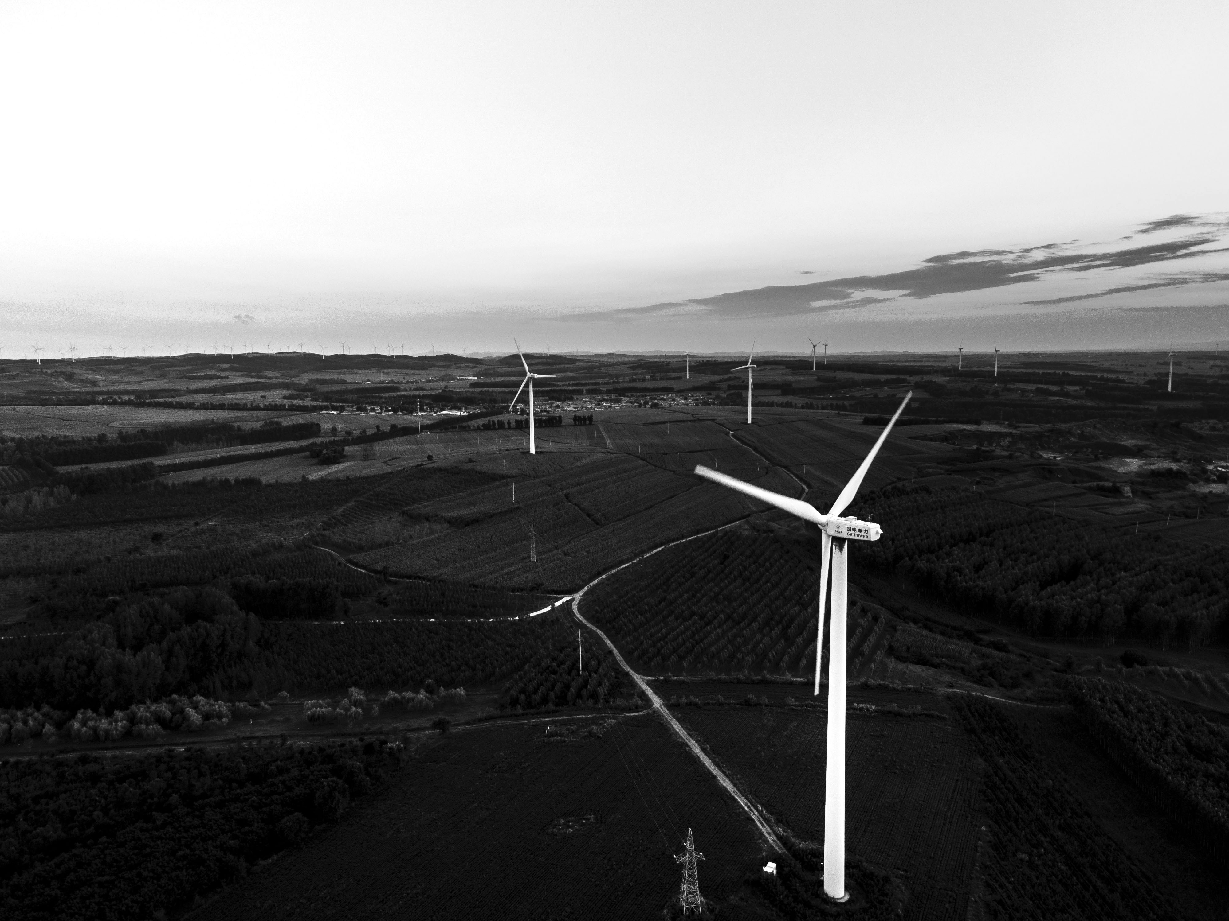 a group of windmills in a field