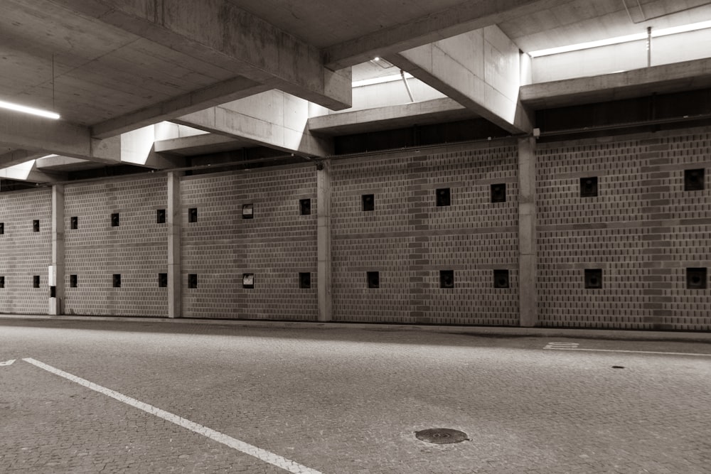 a large brick wall with a hole in it