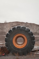 a large tire on a hill