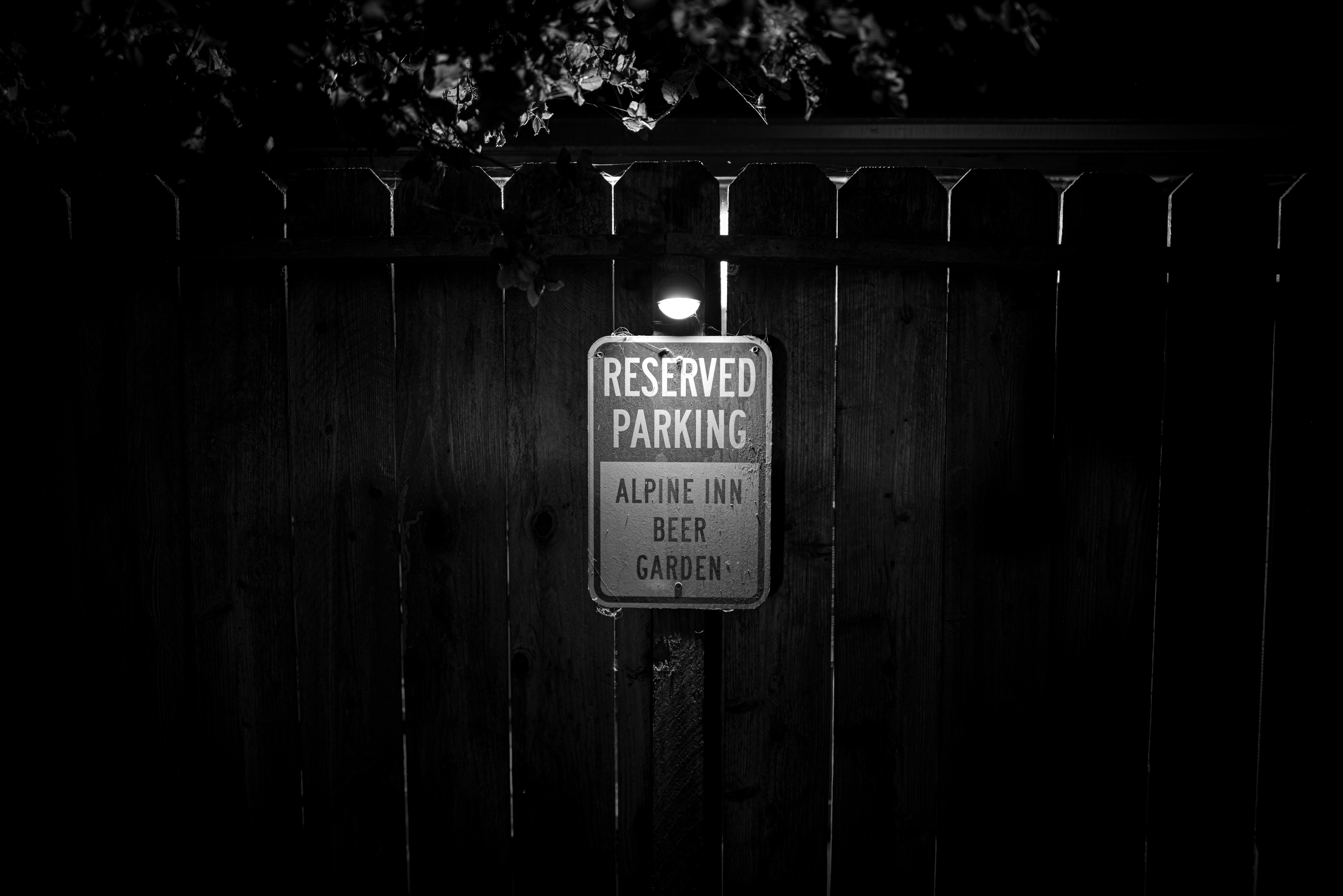a sign on a fence