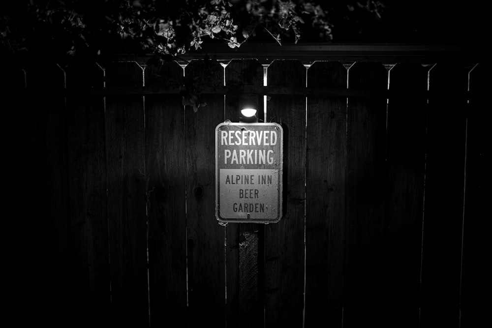 a sign on a fence