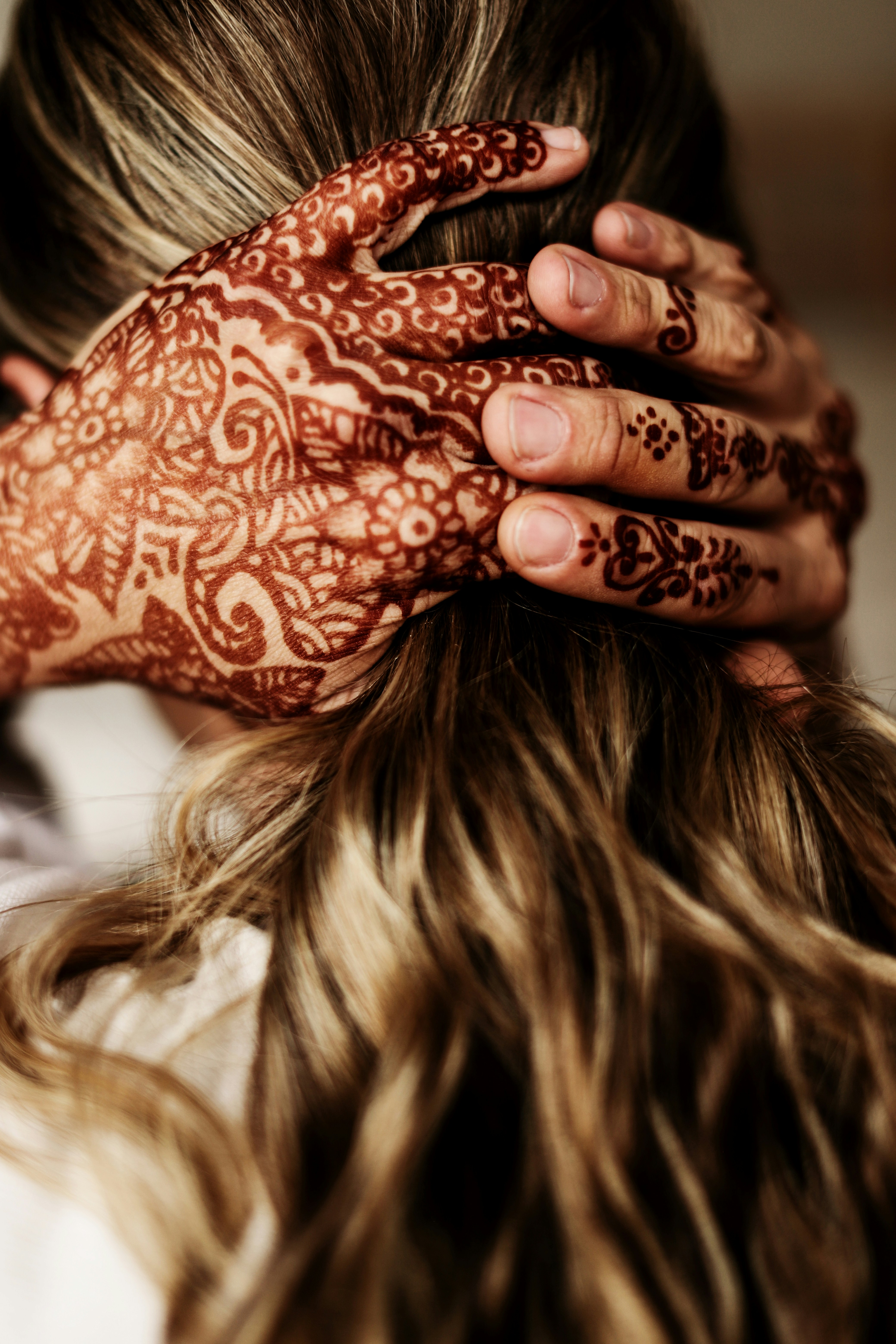 a woman with her hands on her face