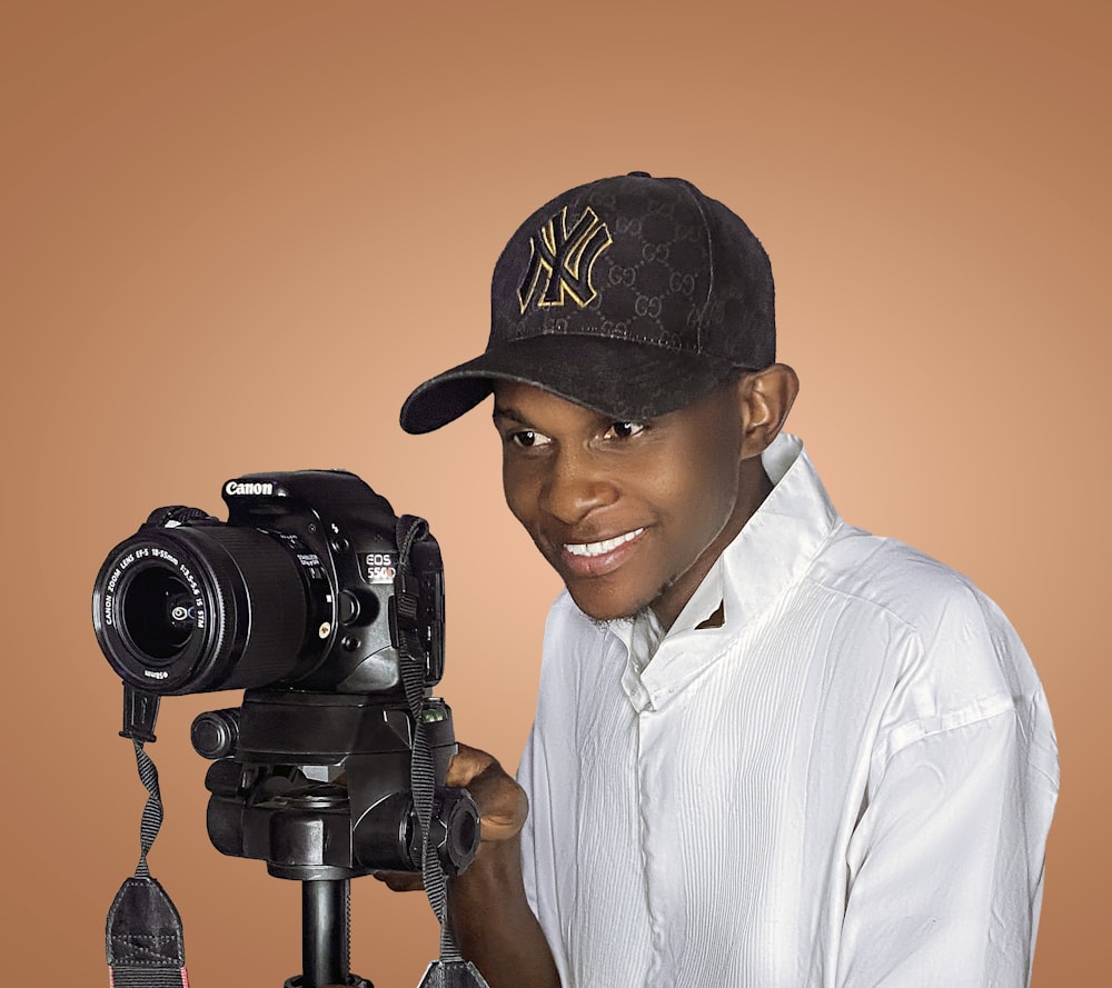 a man holding a camera