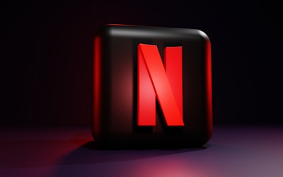 a red letter on a black background