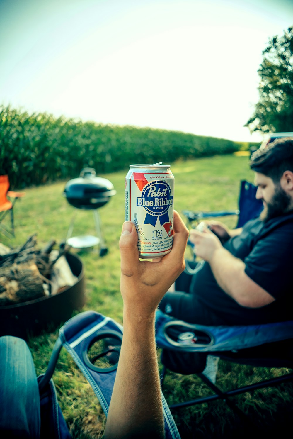 a person holding a can