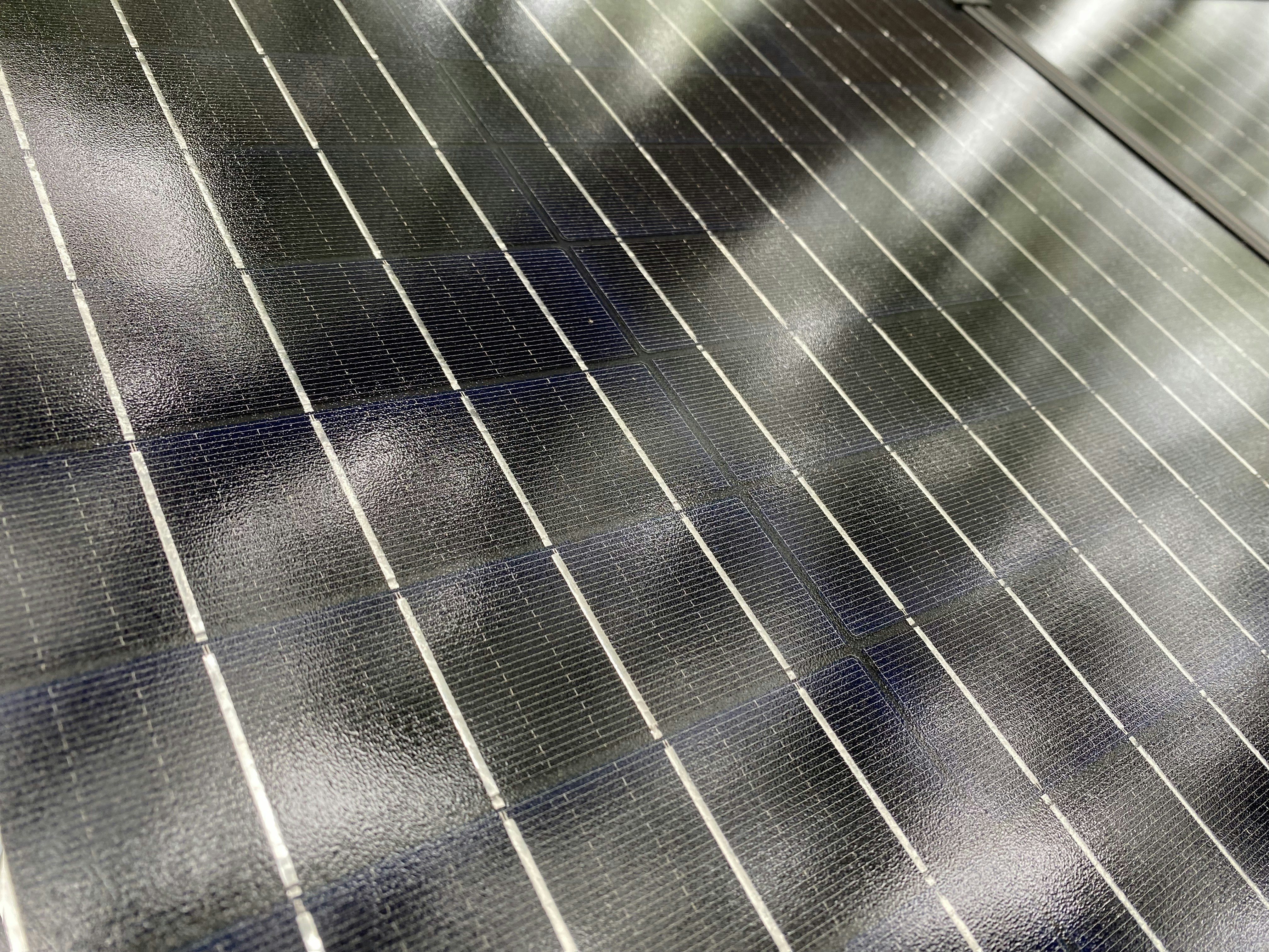 a close up of a black and white striped surface