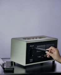 Close-up of a MusicCube amp’s rechargeable battery slot.