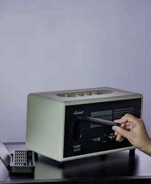 Close-up of a MusicCube amp’s rechargeable battery slot.
