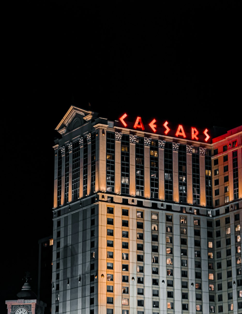 a tall building with a sign on it