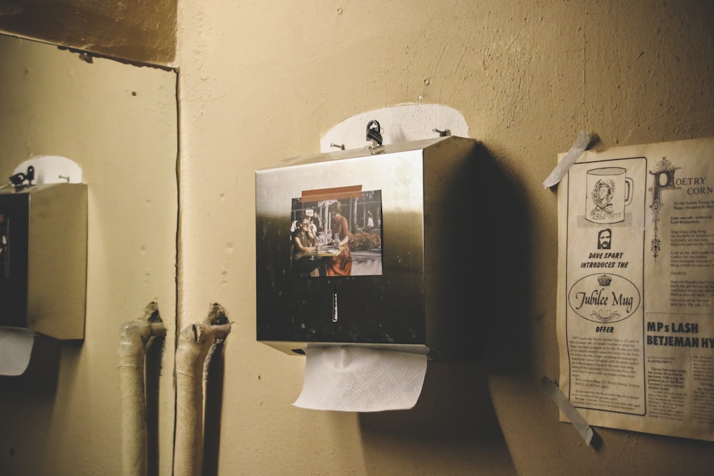 a black box with a picture on it next to a white box