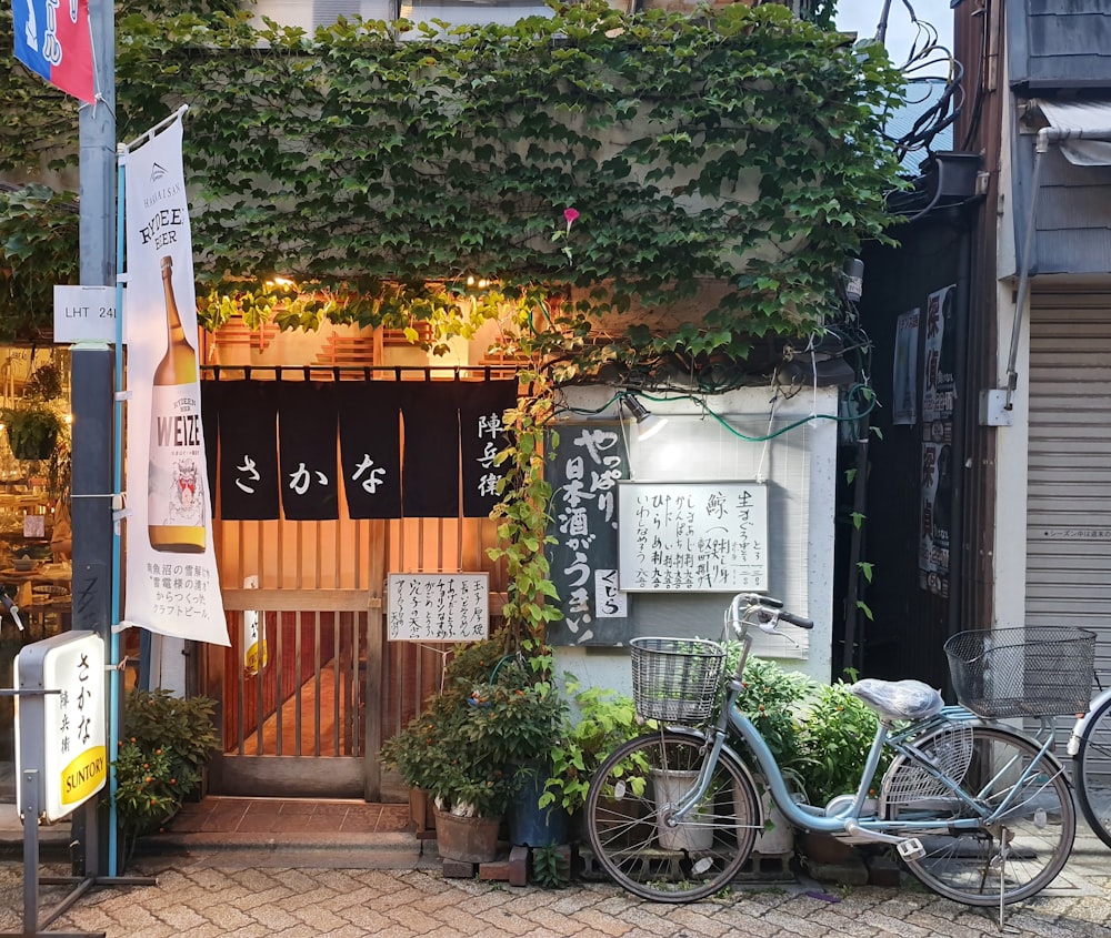 a bicycle parked in front of a store