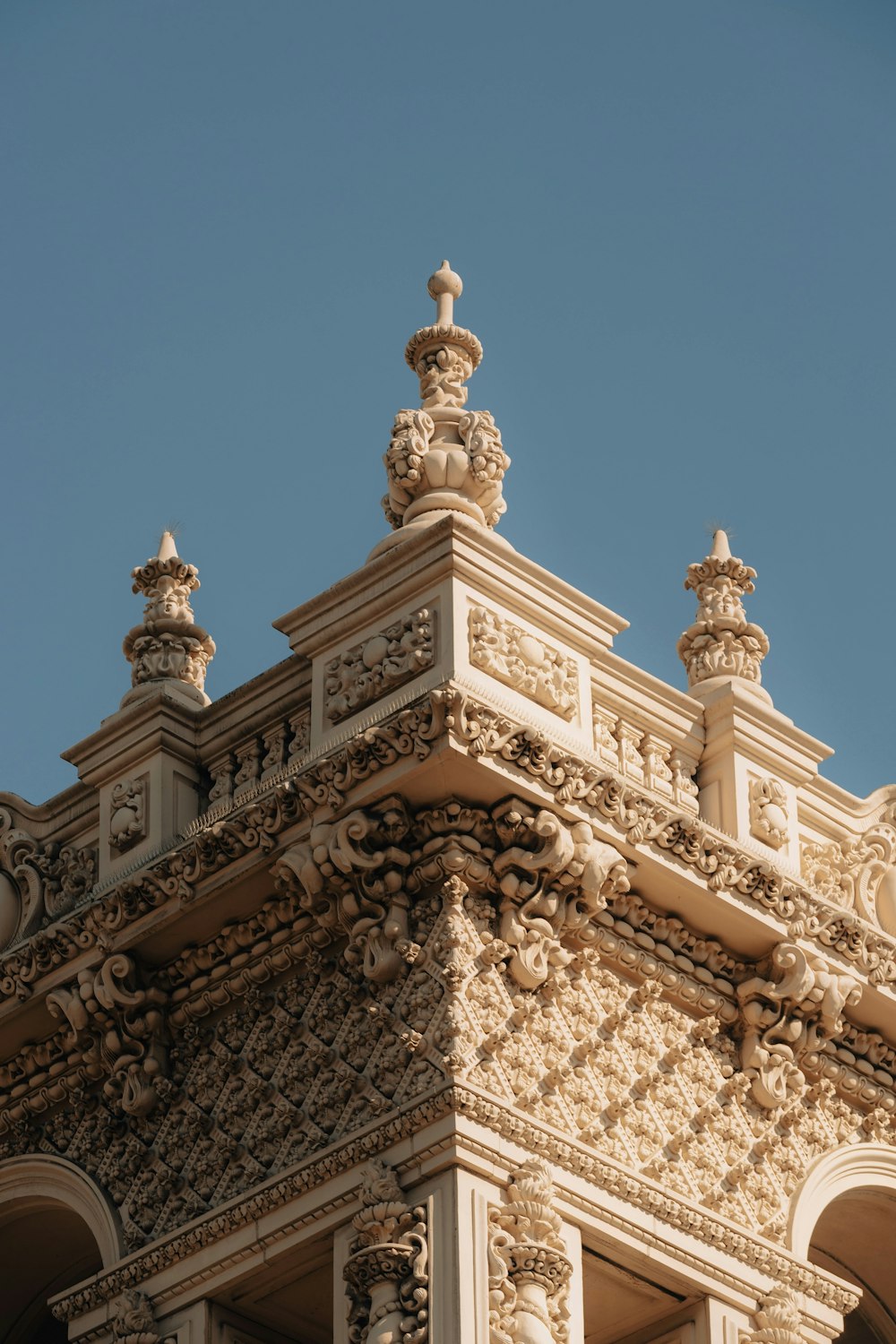 a building with a statue on top