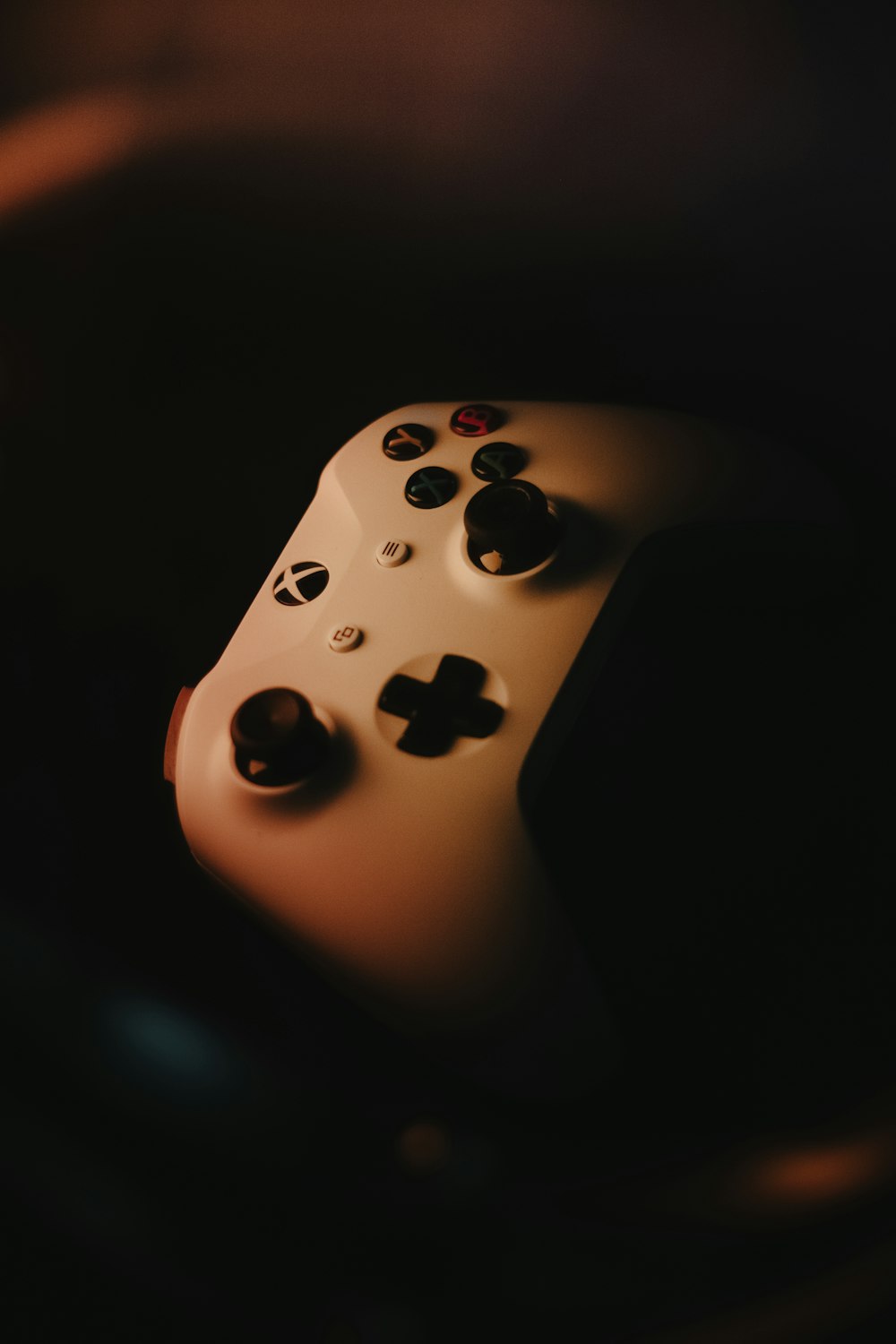 a white and black game controller
