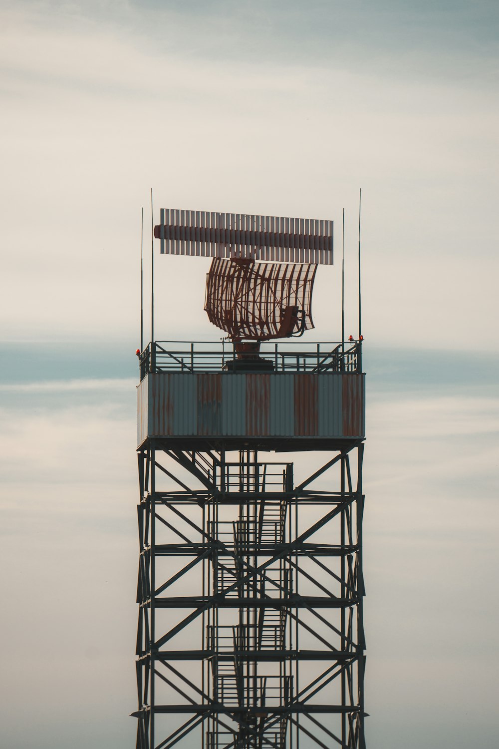 a tower with a basket on top