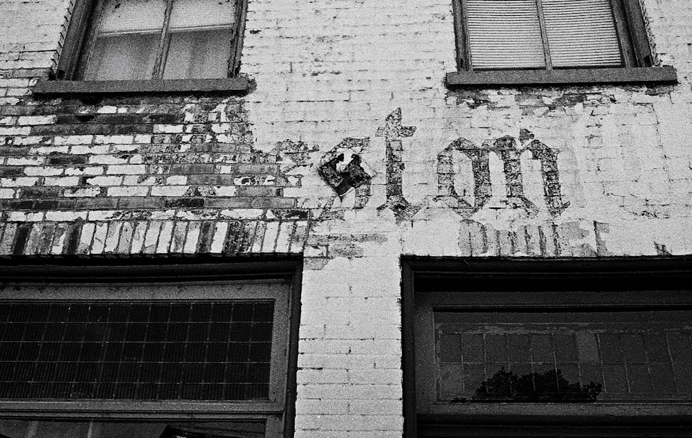 a building with windows and a sign on the side