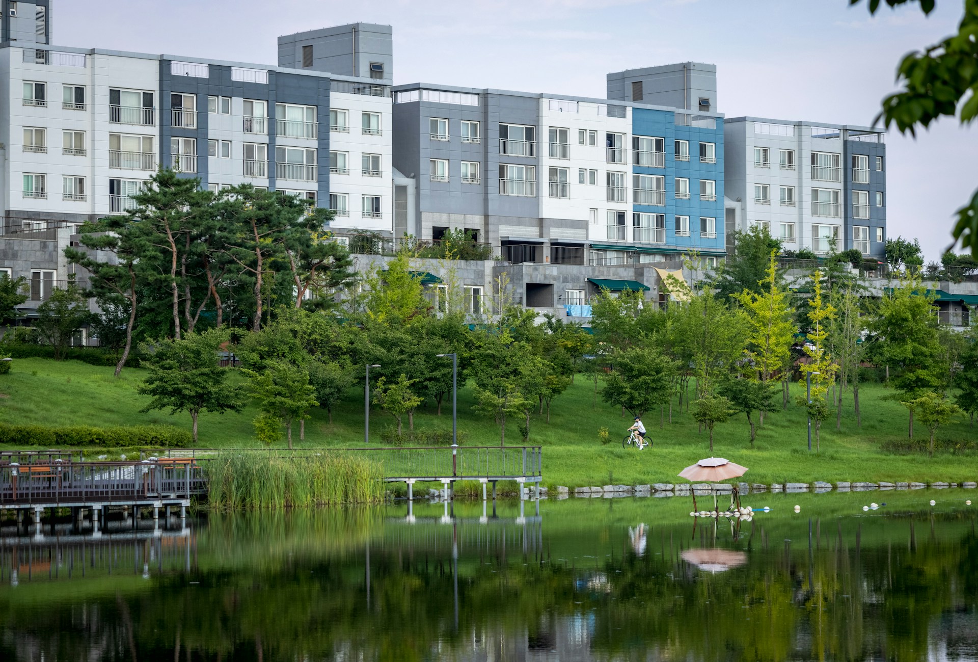 a body of water with buildings in the background