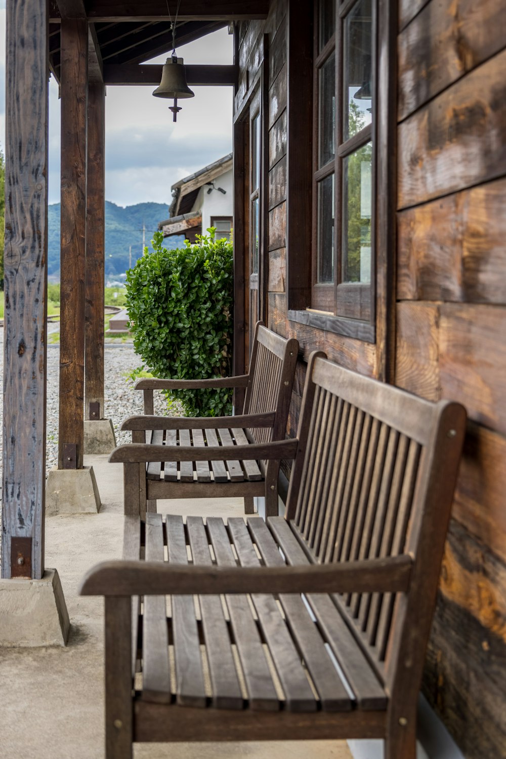 a bench sits outside of a building