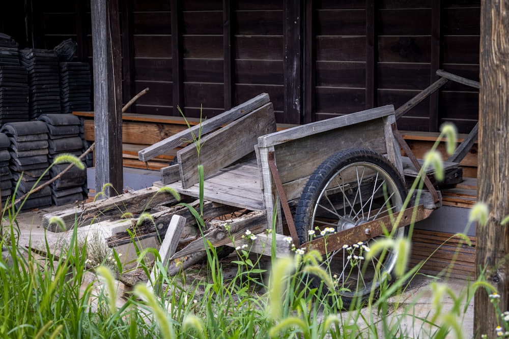 a wooden wagon in a yard