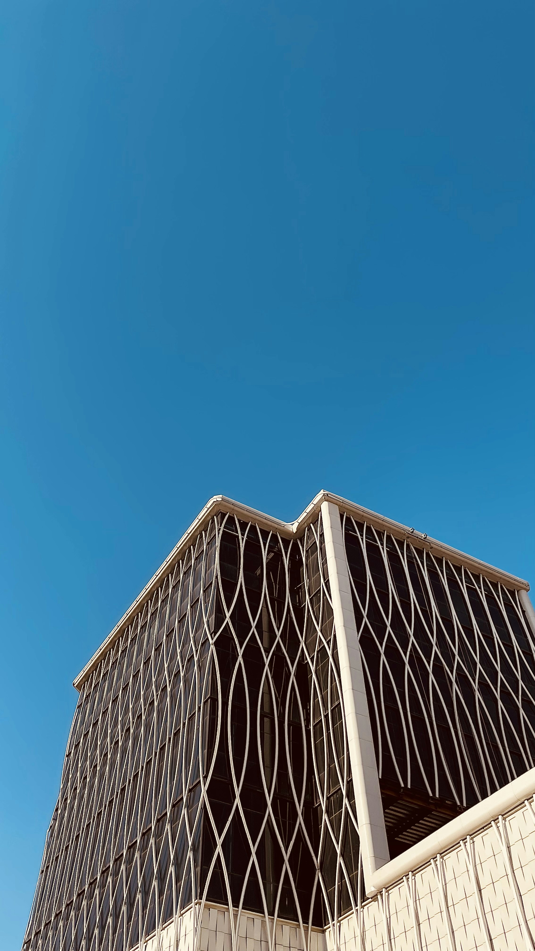 a tall building with a curved roof