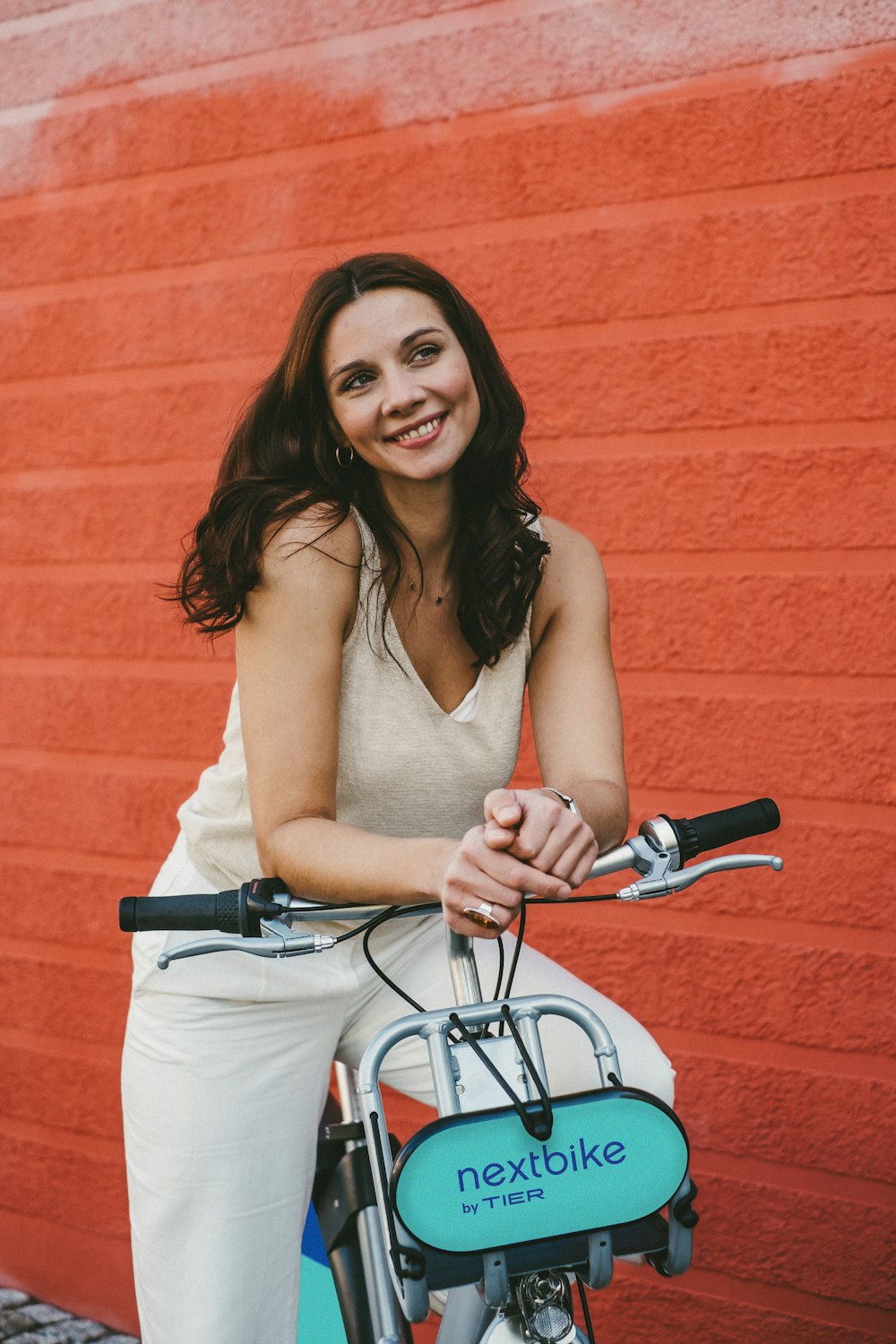 a woman riding a bike