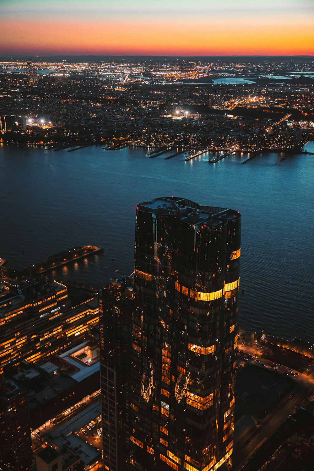 a tall building with lights on at night