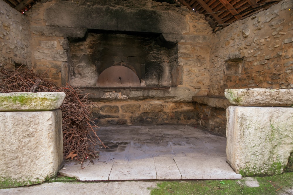 a stone building with a stone wall