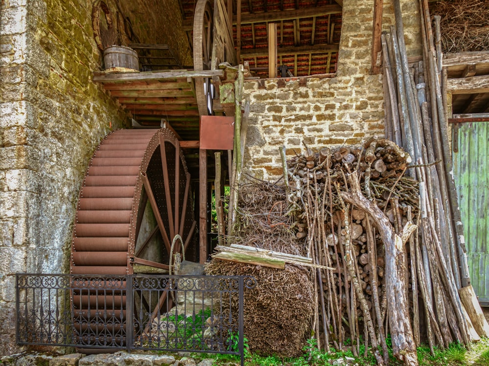 a wooden structure with a wheel