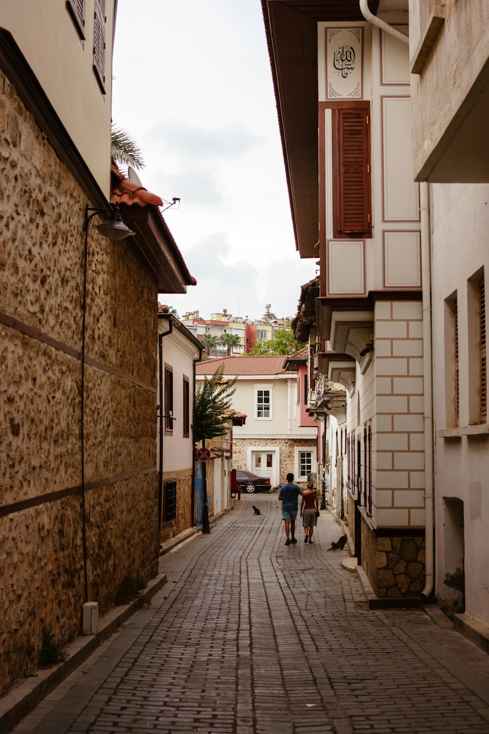 people walking down a street