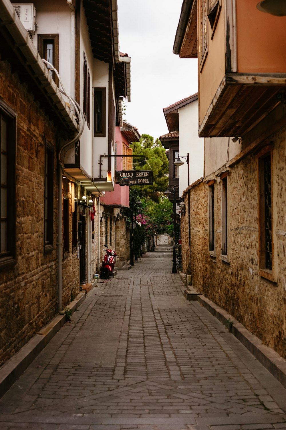 a brick street with buildings on both sides