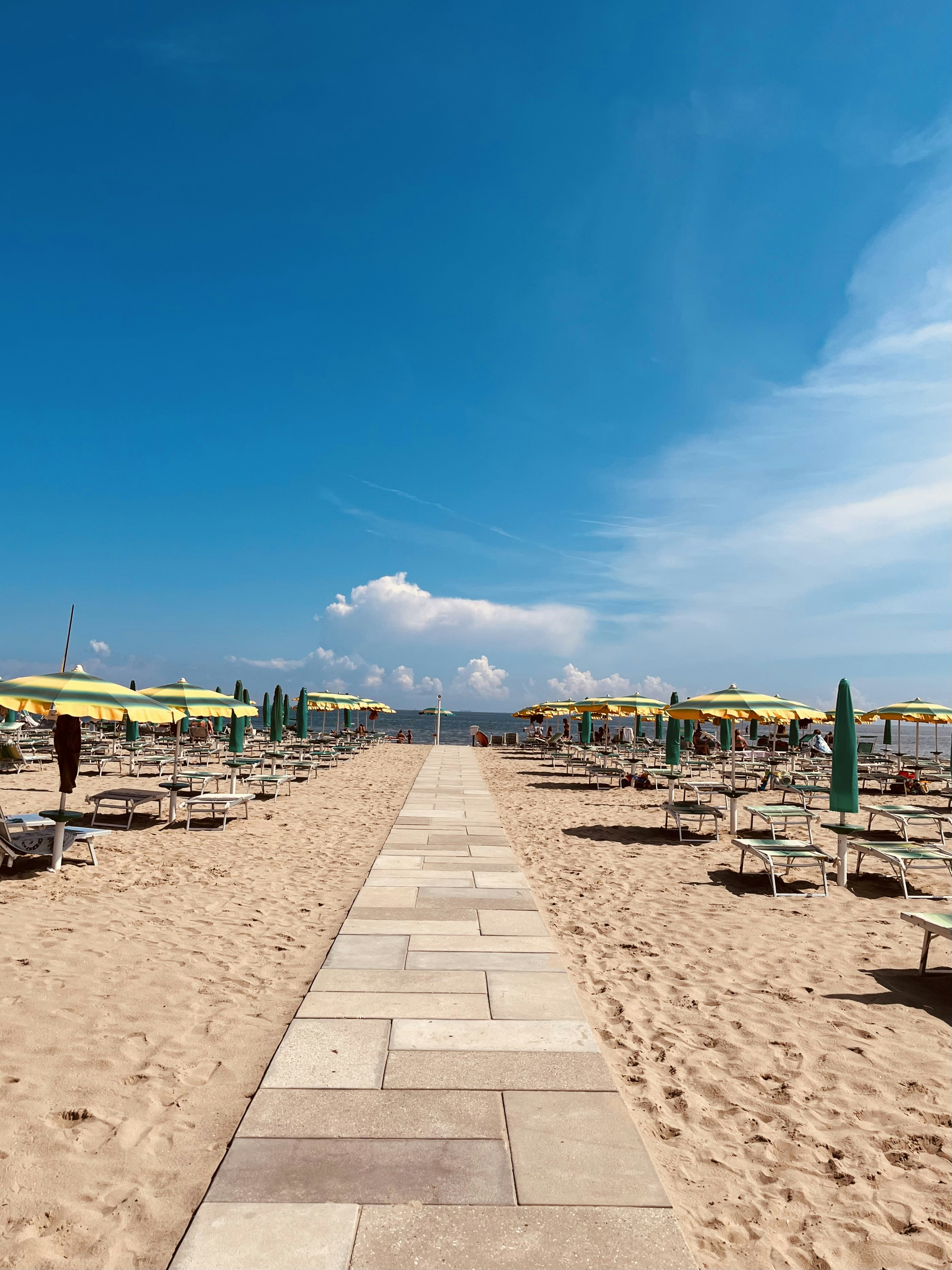 a beach with umbrellas